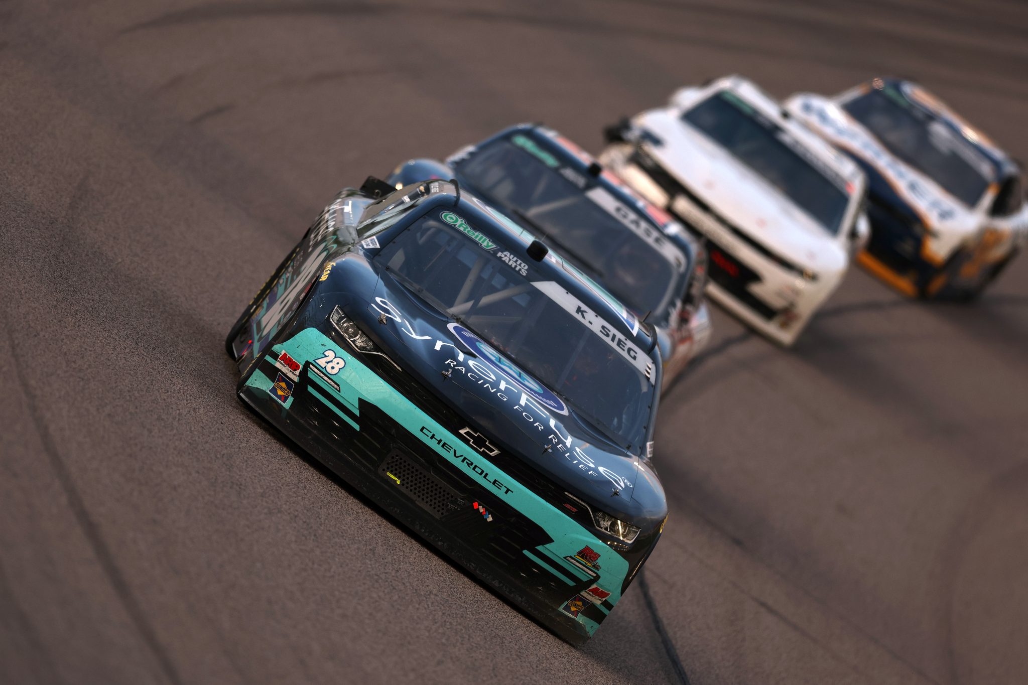 KANSAS CITY, KANSAS - APRIL 18: Kyle Sieg, driver of the #28 SynerFuse Chevrolet, drives during the NASCAR O'Reilly Auto Parts Series Kansas Lottery 300 at Kansas Speedway on April 18, 2026 in Kansas City, Kansas. (Photo by David Jensen/Getty Images) | Getty Images