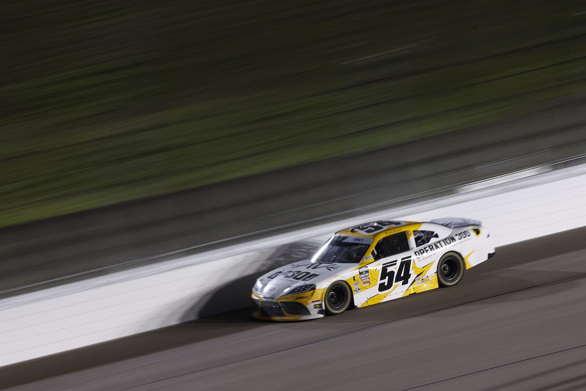 KANSAS CITY, KANSAS - APRIL 18: Taylor Gray, driver of the #54 Operation 300 Toyota, drives during the NASCAR O'Reilly Auto Parts Series Kansas Lottery 300 at Kansas Speedway on April 18, 2026 in Kansas City, Kansas. (Photo by Sean Gardner/Getty Images) | Getty Images