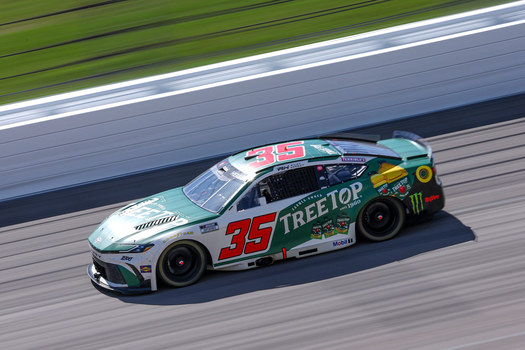KANSAS CITY, KANSAS - APRIL 19: Riley Herbst, driver of the #35 TREETOP Toyota, drives during the NASCAR Cup Series AdventHealth 400 at Kansas Speedway on April 19, 2026 in Kansas City, Kansas. (Photo by David Jensen/Getty Images) | Getty Images