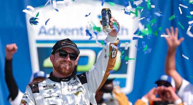 Visit Tyler Reddick keeps the magic alive with overtime NASCAR Cup win at Kansas page