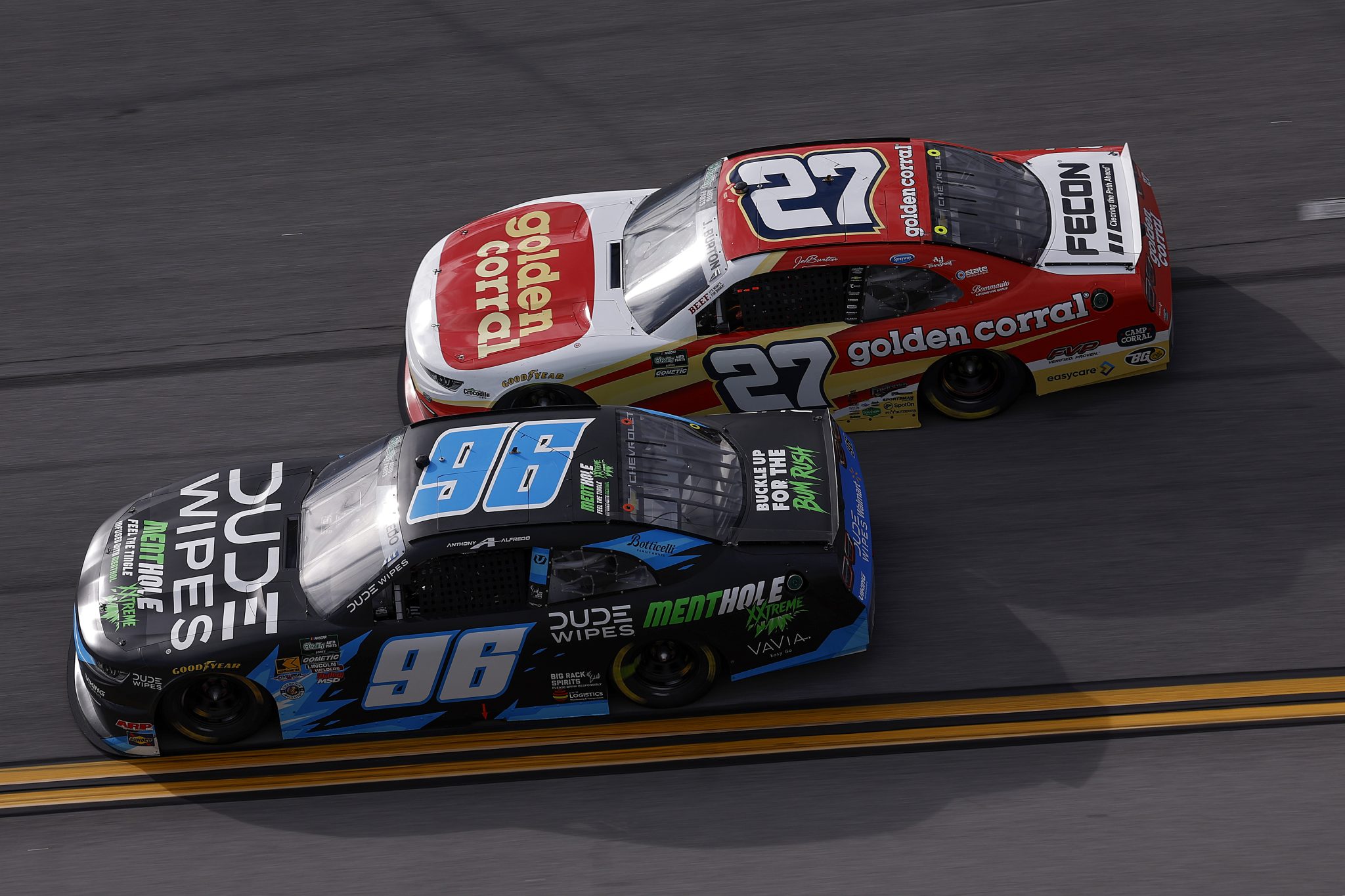 TALLADEGA, ALABAMA - APRIL 25: Anthony Alfredo, driver of the #96 Dude Wipes mentHOLE Chevrolet, and Jeb Burton, driver of the #27 Golden Corral Chevrolet, race during the NASCAR O'Reilly Auto Parts Series Ag-Pro 300 at Talladega Superspeedway on April 25, 2026 in Talladega, Alabama. (Photo by Sean Gardner/Getty Images) | Getty Images