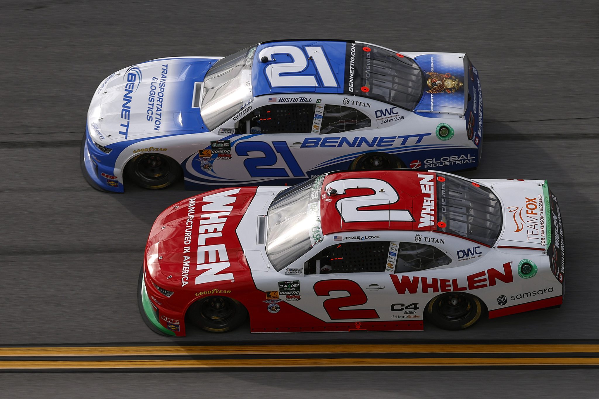TALLADEGA, ALABAMA - APRIL 25: Austin Hill, driver of the #21 Bennett Transportation Chevrolet, and Jesse Love, driver of the #2 Whelen Chevrolet, race during the NASCAR O'Reilly Auto Parts Series Ag-Pro 300 at Talladega Superspeedway on April 25, 2026 in Talladega, Alabama. (Photo by Sean Gardner/Getty Images) | Getty Images