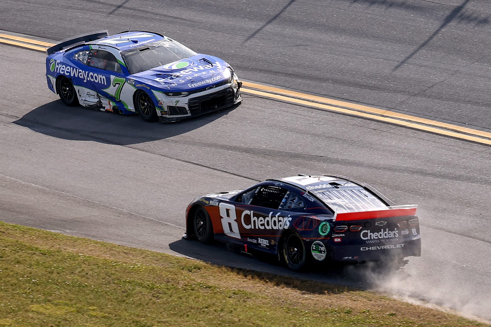 TALLADEGA, ALABAMA - APRIL 26: Kyle Busch, driver of the #8 Cheddar's Scratch Kitchen Chevrolet, and Daniel Suarez, driver of the #7 Freeway Insurance Chevrolet, drive after an on-track incident during the NASCAR Cup Series Jack Link's 500 at Talladega Superspeedway on April 26, 2026 in Talladega, Alabama. (Photo by David Jensen/Getty Images) | Getty Images