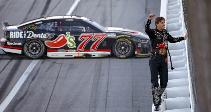 TALLADEGA, ALABAMA - APRIL 26: Carson Hocevar, driver of the #77 Chili's Ride the 'Dente Chevrolet, celebrates with fans after winning the NASCAR Cup Series Jack Link's 500 at Talladega Superspeedway on April 26, 2026 in Talladega, Alabama. (Photo by Sean Gardner/Getty Images) | Getty Images