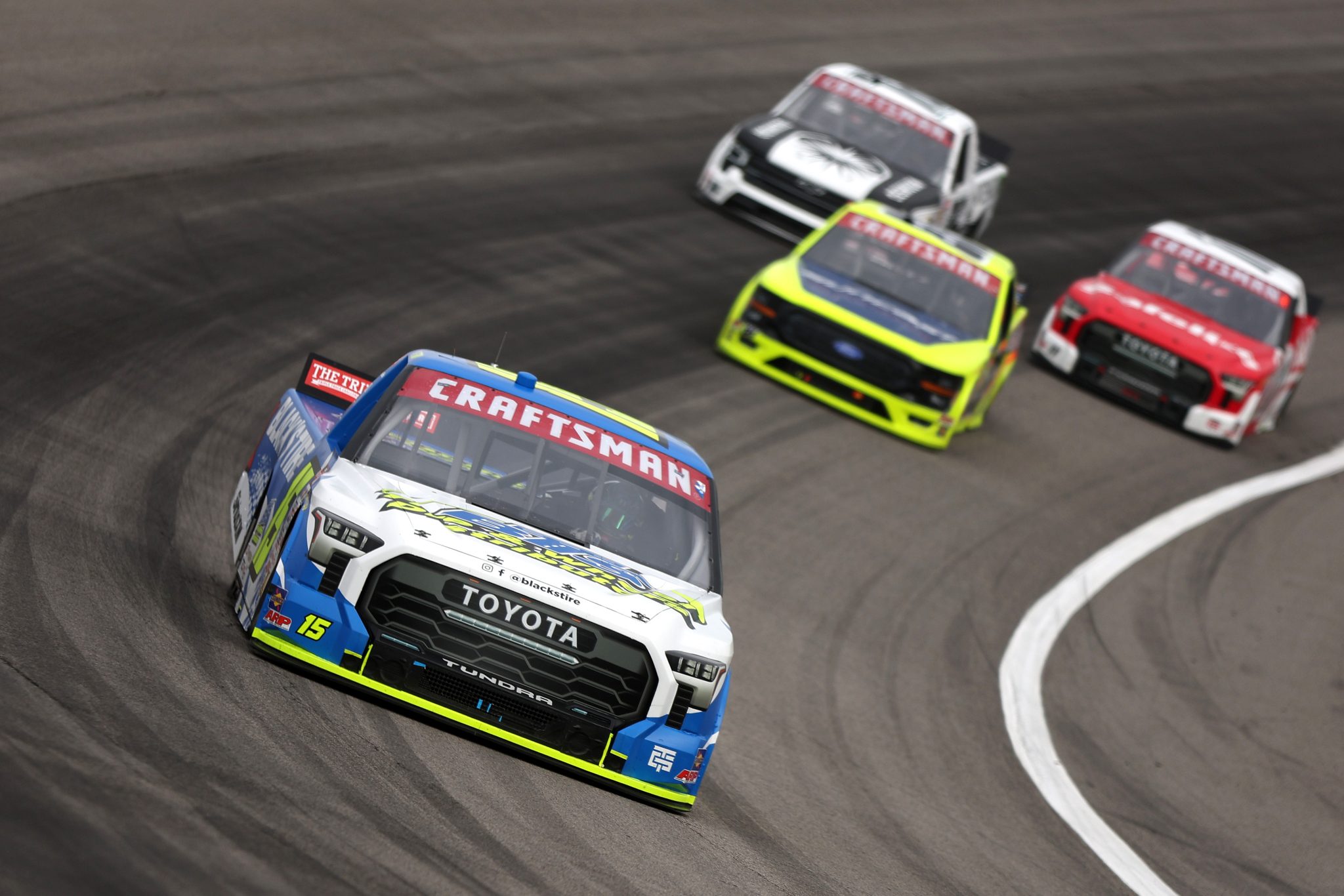 ROCKINGHAM, NORTH CAROLINA - APRIL 03: Tanner Gray, driver of the #15 Black's Tire Toyota, drives during the NASCAR Craftsman Truck Series Black's Tire 200 at Rockingham Speedway on April 03, 2026 in Rockingham, North Carolina. (Photo by Meg Oliphant/Getty Images) | Getty Images