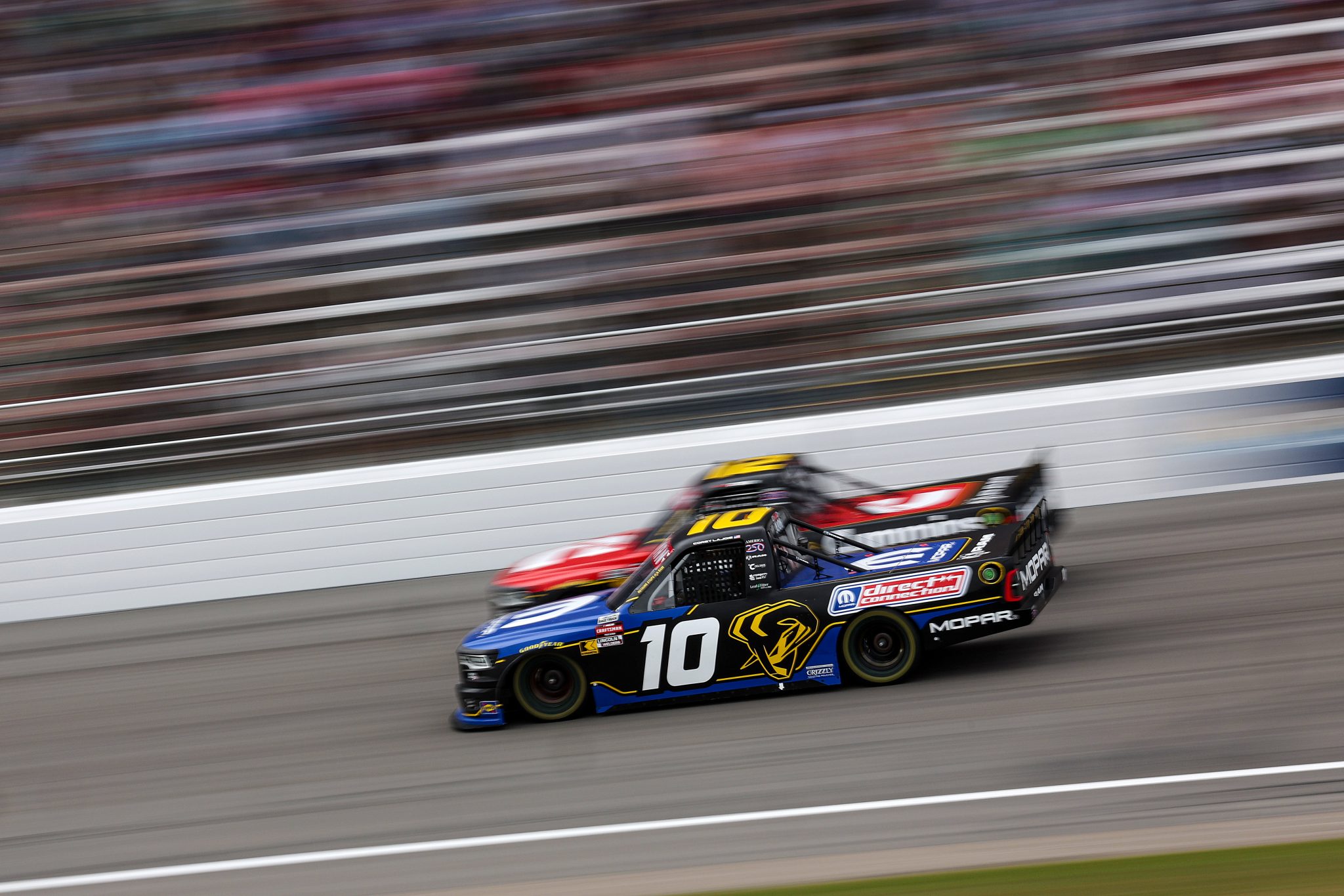 ROCKINGHAM, NORTH CAROLINA - APRIL 03: Corey LaJoie, driver of the #10 Mopar RAM, drives during the NASCAR Craftsman Truck Series Black's Tire 200 at Rockingham Speedway on April 03, 2026 in Rockingham, North Carolina. (Photo by James Gilbert/Getty Images) | Getty Images