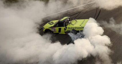 ROCKINGHAM, NORTH CAROLINA - APRIL 03: Corey Heim, driver of the #1 Robinhood Toyota, celebrates with a burnout after winning the NASCAR Craftsman Truck Series Black's Tire 200 at Rockingham Speedway on April 03, 2026 in Rockingham, North Carolina. (Photo by Meg Oliphant/Getty Images) | Getty Images