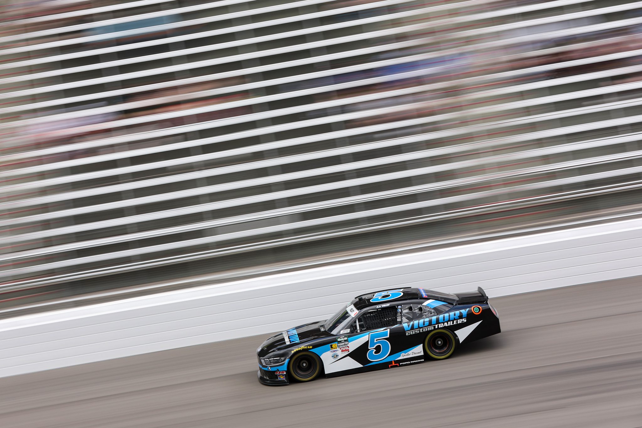 ROCKINGHAM, NORTH CAROLINA - APRIL 03: JJ Yeley, driver of the #5 Victory Custom Trailers Ford, drives during practice for the NASCAR O'Reilly Auto Parts Series North Carolina Education Lottery 250 Presented by Black's Tire at Rockingham Speedway on April 03, 2026 in Rockingham, North Carolina. (Photo by Meg Oliphant/Getty Images) | Getty Images