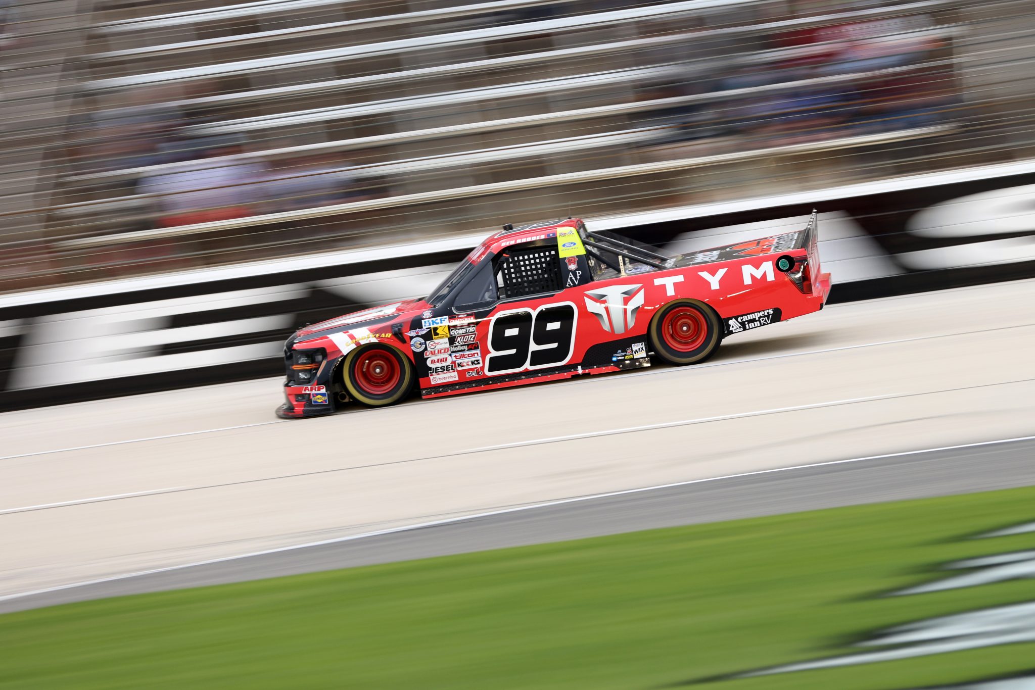 FORT WORTH, TEXAS - MAY 01: Ben Rhodes, driver of the #99 TYM Ford, races during the NASCAR Craftsman Truck Series SpeedyCash.com 250 at Texas Motor Speedway on May 01, 2026 in Fort Worth, Texas. (Photo by Tim Heitman/Getty Images) | Getty Images