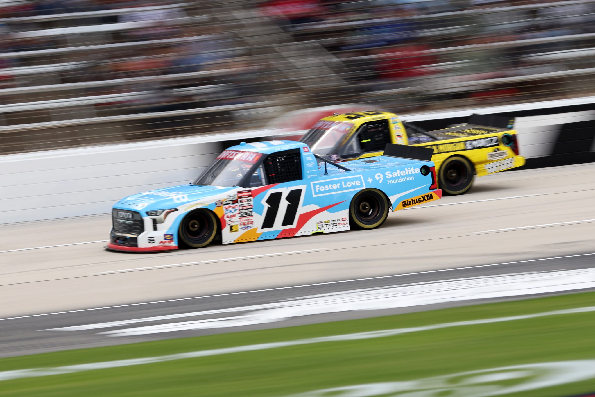 FORT WORTH, TEXAS - MAY 01: Kaden Honeycutt, driver of the #11 Safelite/Foster Love Toyota, races during the NASCAR Craftsman Truck Series SpeedyCash.com 250 at Texas Motor Speedway on May 01, 2026 in Fort Worth, Texas. (Photo by Tim Heitman/Getty Images) | Getty Images