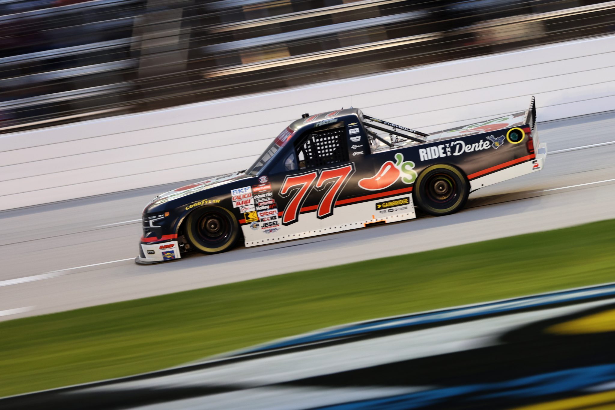 FORT WORTH, TEXAS - MAY 01: Carson Hocevar, driver of the #77 Chili's Ride the ' Dente Chevrolet, races during the NASCAR Craftsman Truck Series SpeedyCash.com 250 at Texas Motor Speedway on May 01, 2026 in Fort Worth, Texas. (Photo by Tim Heitman/Getty Images) | Getty Images