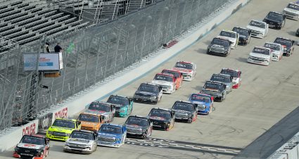 DOVER, DELAWARE - AUGUST 21: Brett Moffitt, driver of the #23 Arlon Chevrolet, and Sheldon Creed, driver of the #2 Chevy Accessories Chevrolet, lead the field to start the NASCAR Gander RV & Outdoors Truck Series KDI Office Technology 200 at Dover International Speedway on August 21, 2020 in Dover, Delaware. (Photo by Hunter Martin/Getty Images) | Getty Images