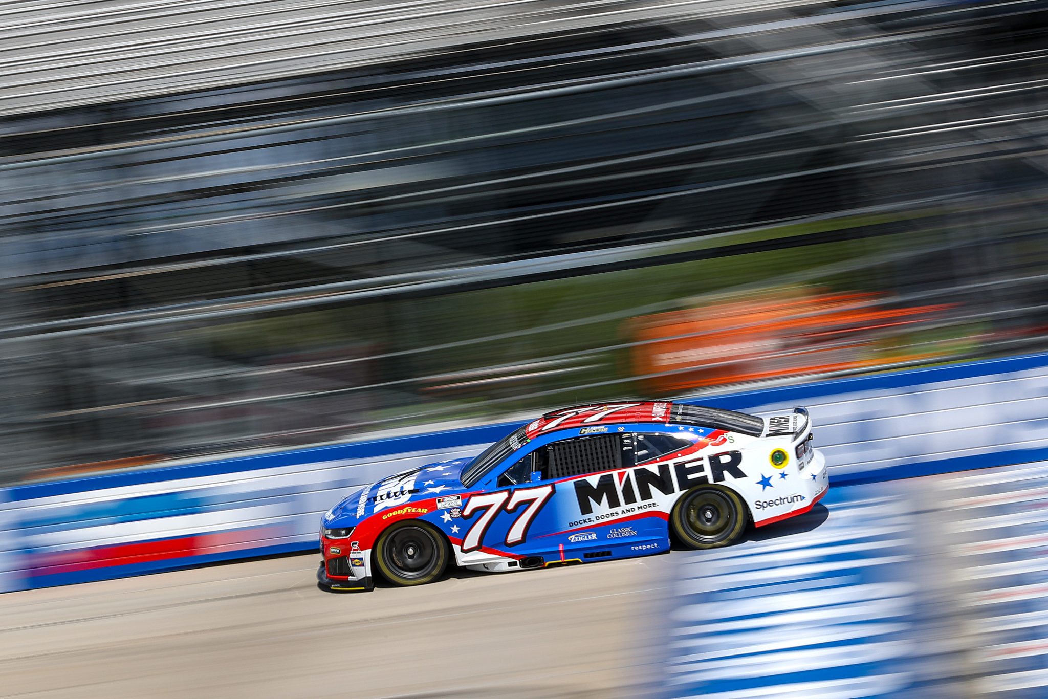 DOVER, DELAWARE - MAY 15: Carson Hocevar, driver of the #77 Miner Docks Doors and More Chevrolet, drives during NASCAR Cup Series All-Star Race - Pit Road Qualifying Entry/Exit practice at Dover Motor Speedway on May 15, 2026 in Dover, Delaware. (Photo by Meg Oliphant/Getty Images) | Getty Images