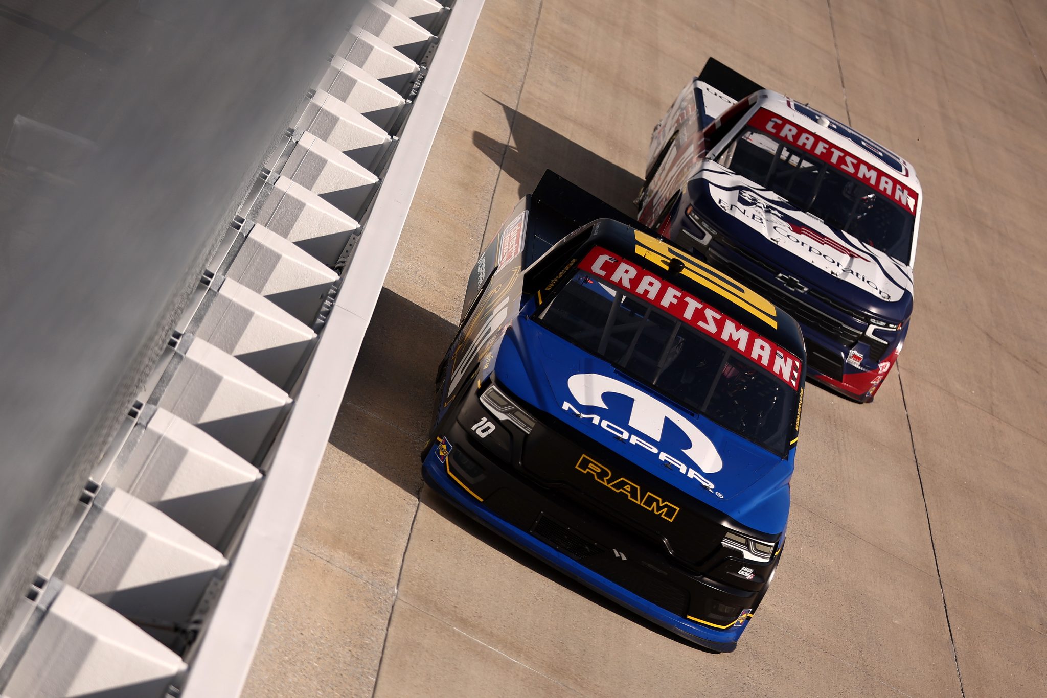 DOVER, DELAWARE - MAY 15: Corey LaJoie, driver of the #10 Mopar RAM, and Kris Wright, driver of the #81 F.N.B. Corporation Chevrolet, race during the NASCAR Craftsman Truck Series ECOSAVE 200 at Dover Motor Speedway on May 15, 2026 in Dover, Delaware. (Photo by Meg Oliphant/Getty Images) | Getty Images