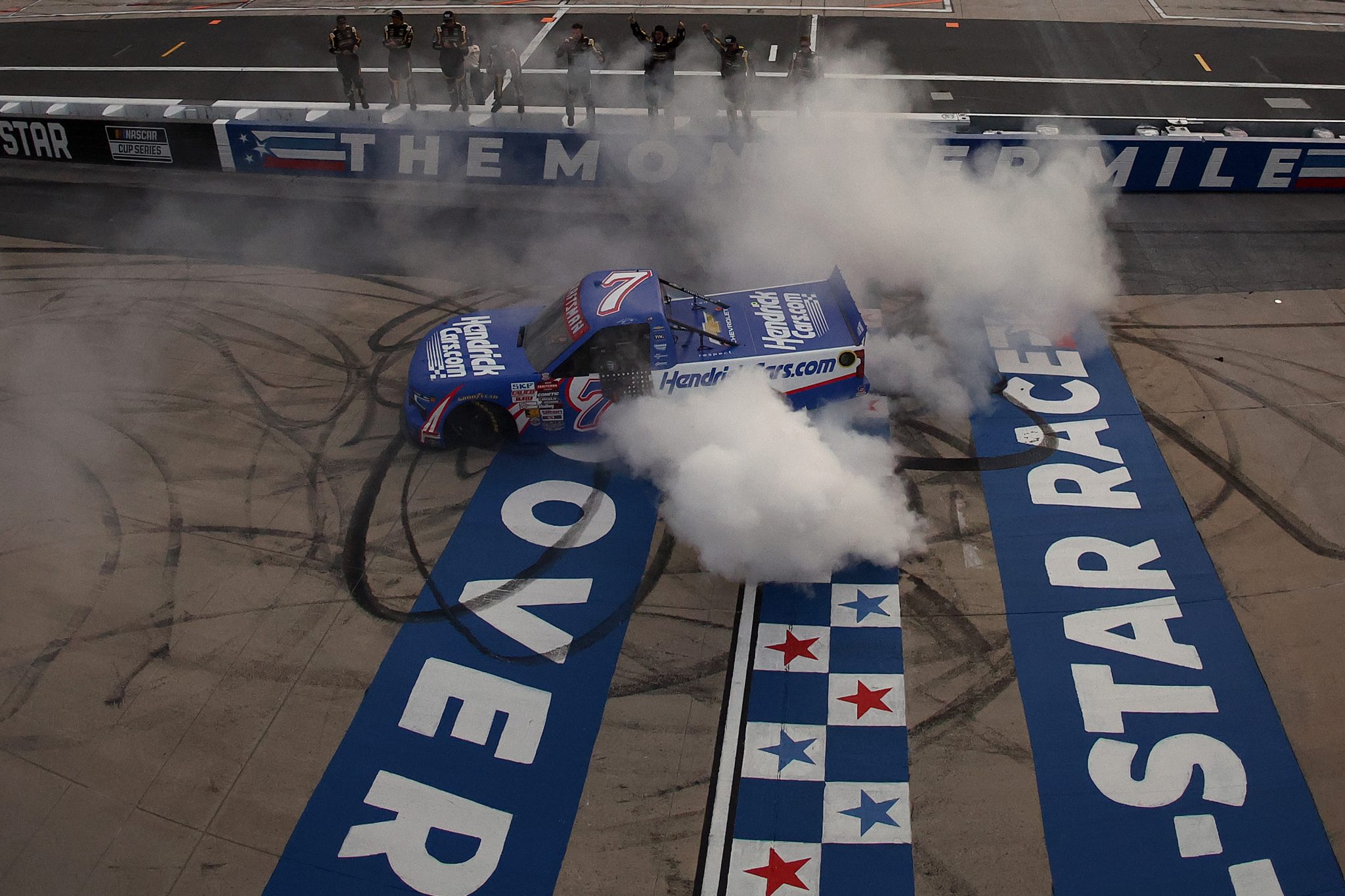 DOVER, DELAWARE - MAY 15: Kyle Busch, driver of the #7 HendrickCars.com Chevrolet, celebrates with a burnout after winning the NASCAR Craftsman Truck Series ECOSAVE 200 at Dover Motor Speedway on May 15, 2026 in Dover, Delaware. (Photo by Meg Oliphant/Getty Images) | Getty Images