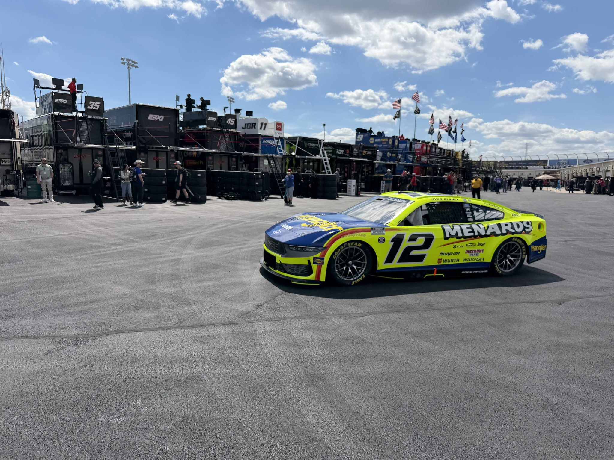 DOVER, DELAWARE – MAY 15: Ryan Blaney, driver of the #12 Menards / Wrangler Ford, drives through the garage before practice for the NASCAR Cup Series All-Star Race at Dover Motor Speedway on May 15, 2026 in Dover, Delaware. (Photo by Dustin Albino of Jayski.com)