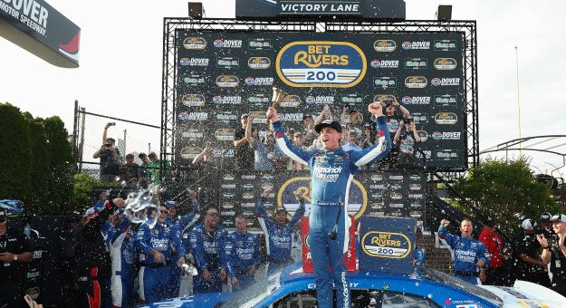 Visit Corey Day passes Justin Allgaier in closing laps to win Dover page
