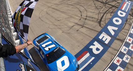 DOVER, DELAWARE - MAY 17: Denny Hamlin, driver of the #11 Progressive Insurance Toyota, takes the checkered flag to win the NASCAR Cup Series All-Star Race at Dover Motor Speedway on May 17, 2026 in Dover, Delaware. (Photo by Meg Oliphant/Getty Images) | Getty Images