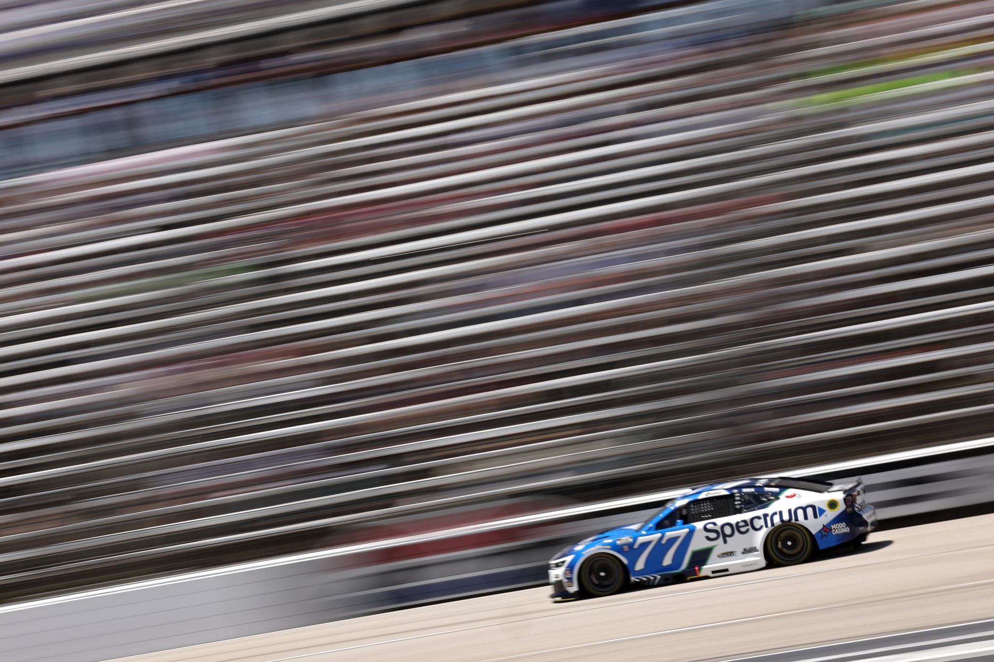FORT WORTH, TEXAS - MAY 02: Carson Hocevar, driver of the #77 Spectrum Chevrolet, races during qualifying for the NASCAR Cup Series Würth 400 presented by LIQUI MOLY at Texas Motor Speedway on May 02, 2026 in Fort Worth, Texas. (Photo by James Gilbert/Getty Images) | Getty Images