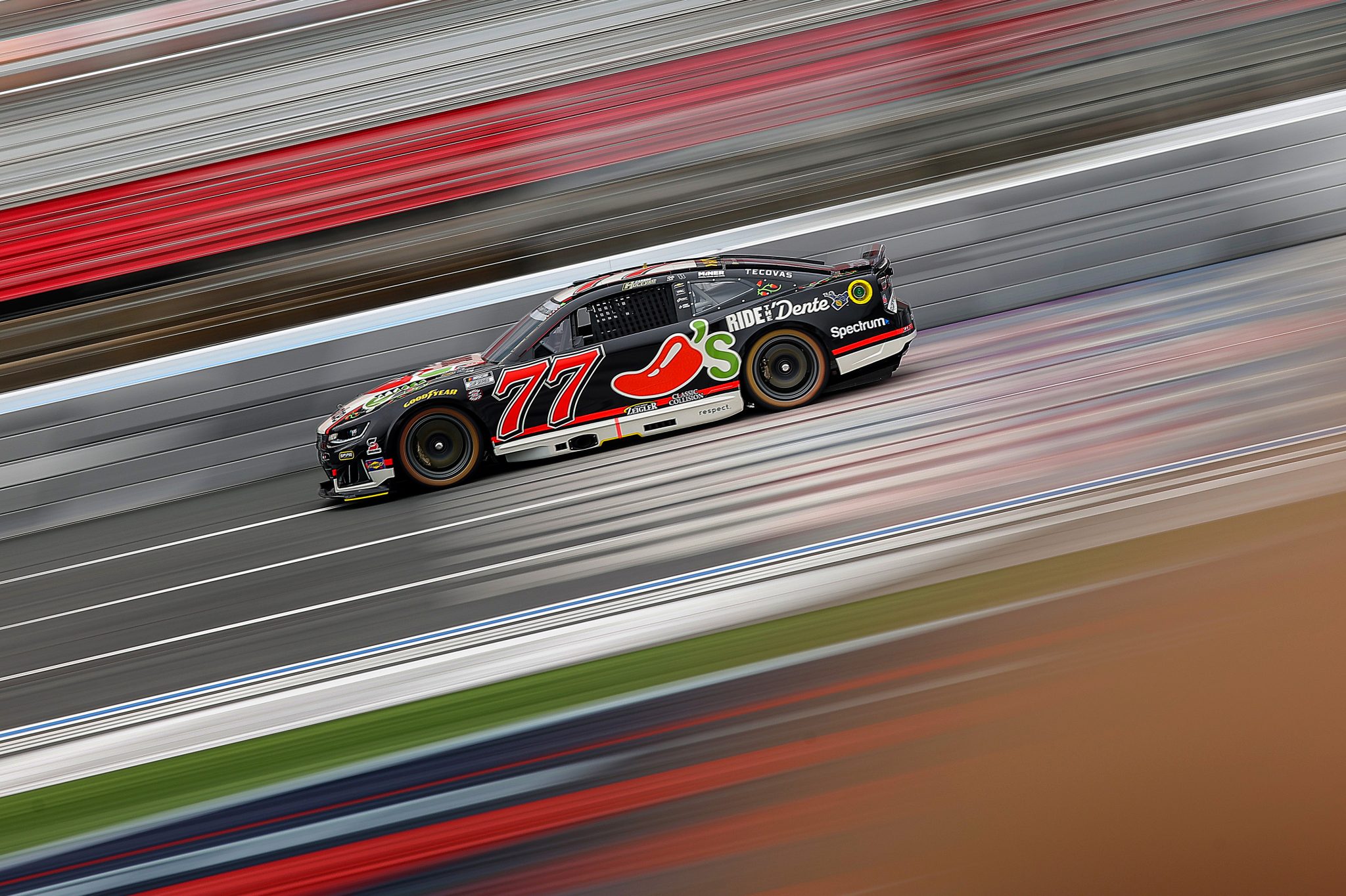 CONCORD, NORTH CAROLINA - MAY 23: Carson Hocevar, driver of the #77 Chili's Ride the 'Dente Chevrolet, drives during practice for the NASCAR Cup Series Coca-Cola 600 at Charlotte Motor Speedway on May 23, 2026 in Concord, North Carolina. (Photo by Jonathan Bachman/Getty Images) | Getty Images