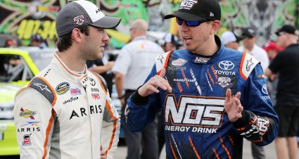 SPARTA, KY - JULY 07: Kyle Busch, driver of the #18 NOS Energy Drink Toyota, talks to Daniel Suarez, driver of the #19 ARRIS Toyota, during qualifying for the NASCAR Camping World Truck Series Buckle Up In Your Truck 225 at Kentucky Speedway on July 7, 2016 in Sparta, Kentucky.  (Photo by Jerry Markland/Getty Images) | Getty Images