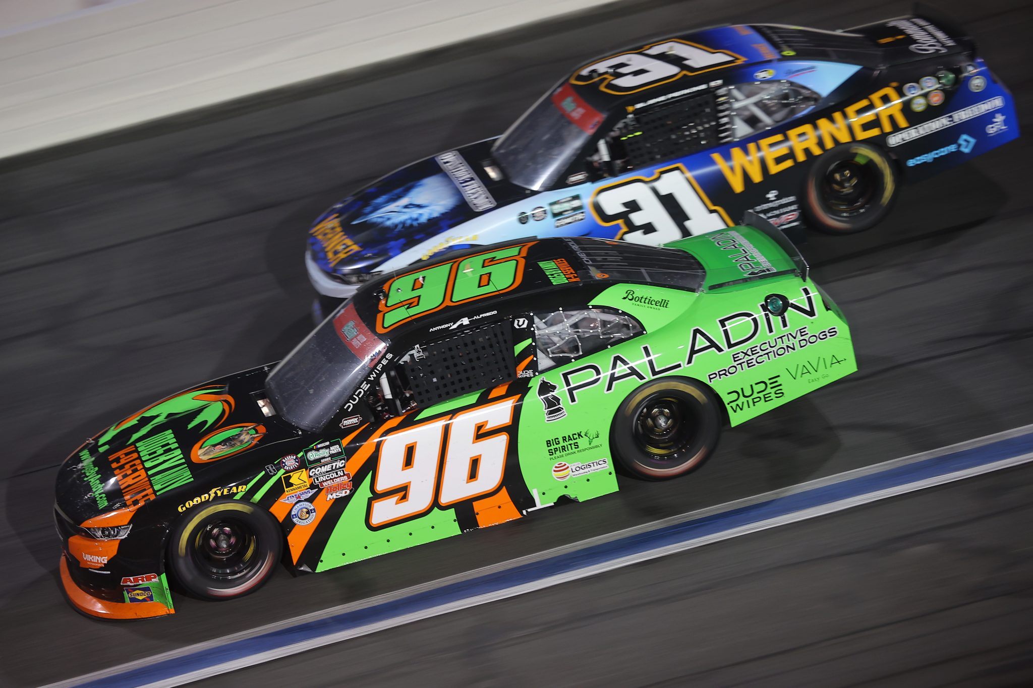 CONCORD, NORTH CAROLINA - MAY 23: Anthony Alfredo, driver of the #96 Dogs By Andy K-9 Services Chevrolet, and Blaine Perkins, driver of the #31 Werner Operation Freedom Chevrolet, race during the NASCAR O'Reilly Auto Parts Series Charbroil 300 at Charlotte Motor Speedway on May 23, 2026 in Concord, North Carolina. (Photo by Jonathan Bachman/Getty Images) | Getty Images