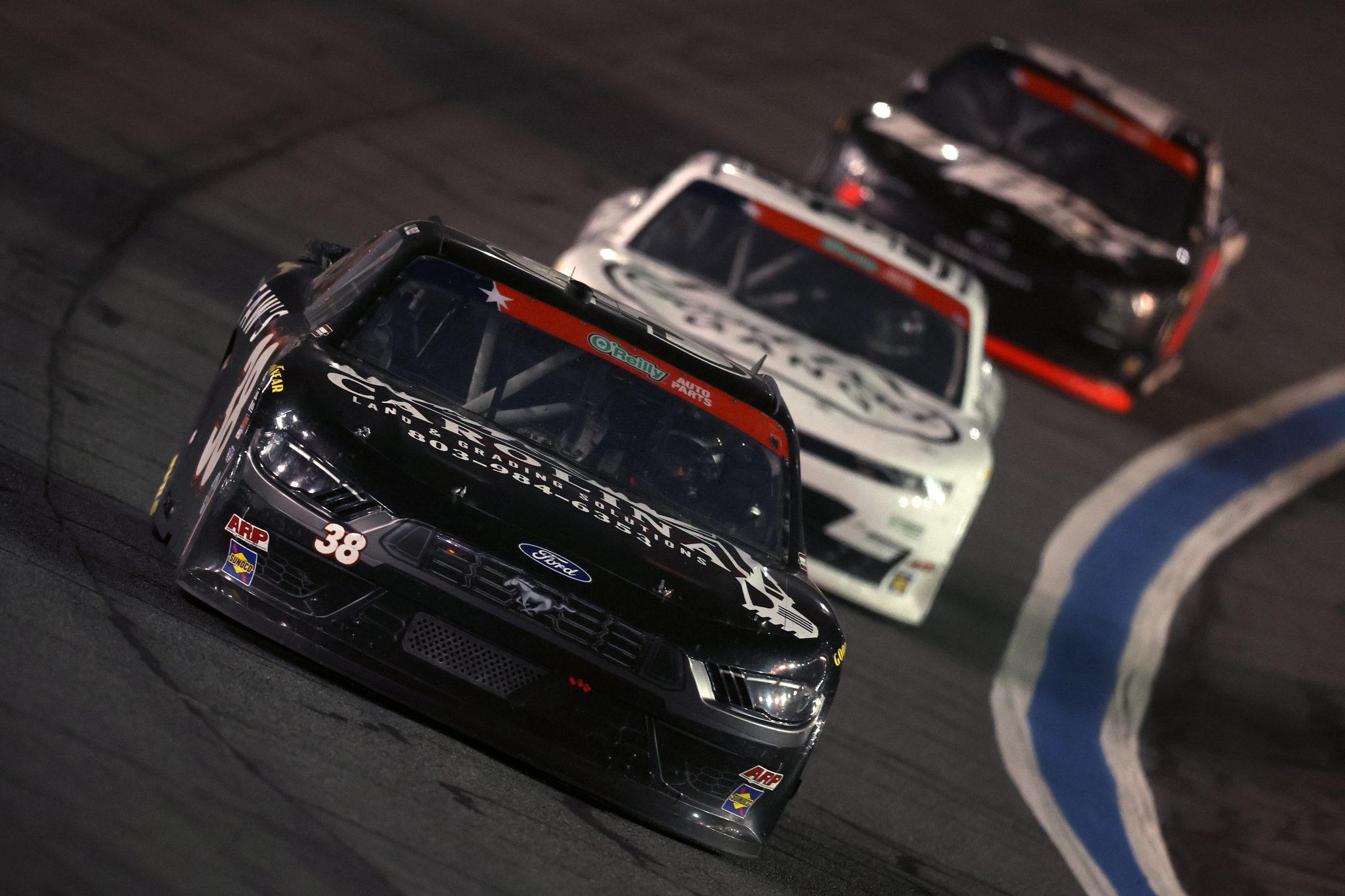 CONCORD, NORTH CAROLINA - MAY 23: JJ Yeley, driver of the #38 Carolina Land & Grading Solutions Ford, drives during the NASCAR O'Reilly Auto Parts Series Charbroil 300 at Charlotte Motor Speedway on May 23, 2026 in Concord, North Carolina. (Photo by David Jensen/Getty Images) | Getty Images