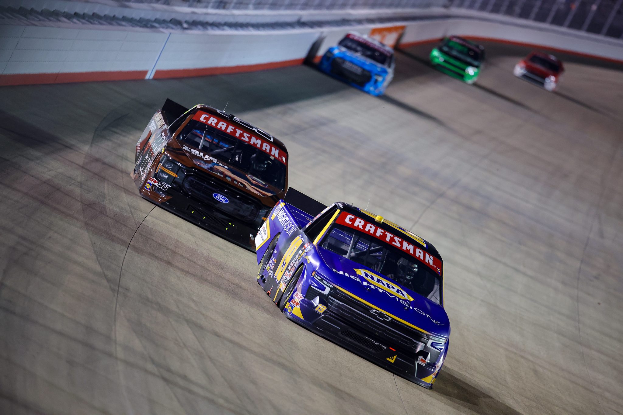 LEBANON, TENNESSEE - MAY 29: Daniel Hemric, driver of the #19 NAPA Nightvision Chevrolet, and Jake Garcia, driver of the #98 Curb Records Ford, race during the NASCAR Craftsman Truck Series Allegiance 200 at Nashville Superspeedway on May 29, 2026 in Lebanon, Tennessee. (Photo by Jonathan Bachman/Getty Images) | Getty Images