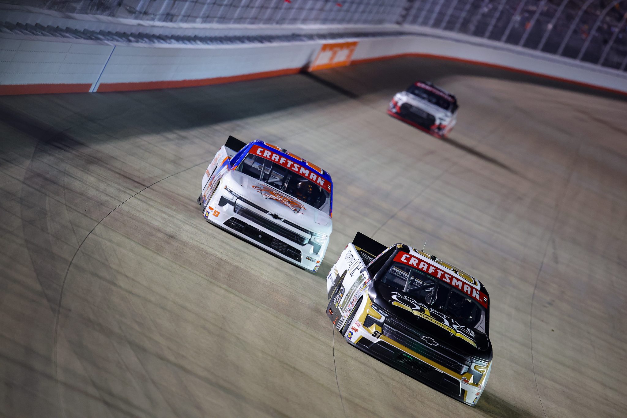 LEBANON, TENNESSEE - MAY 29: Christian Eckes, driver of the #91 Adaptive One Calipers Chevrolet, and Caleb Costner, driver of the #93 Lickety Lew's/Michael Waltrip Brewing Chevrolet, race during the NASCAR Craftsman Truck Series Allegiance 200 at Nashville Superspeedway on May 29, 2026 in Lebanon, Tennessee. (Photo by Jonathan Bachman/Getty Images) | Getty Images