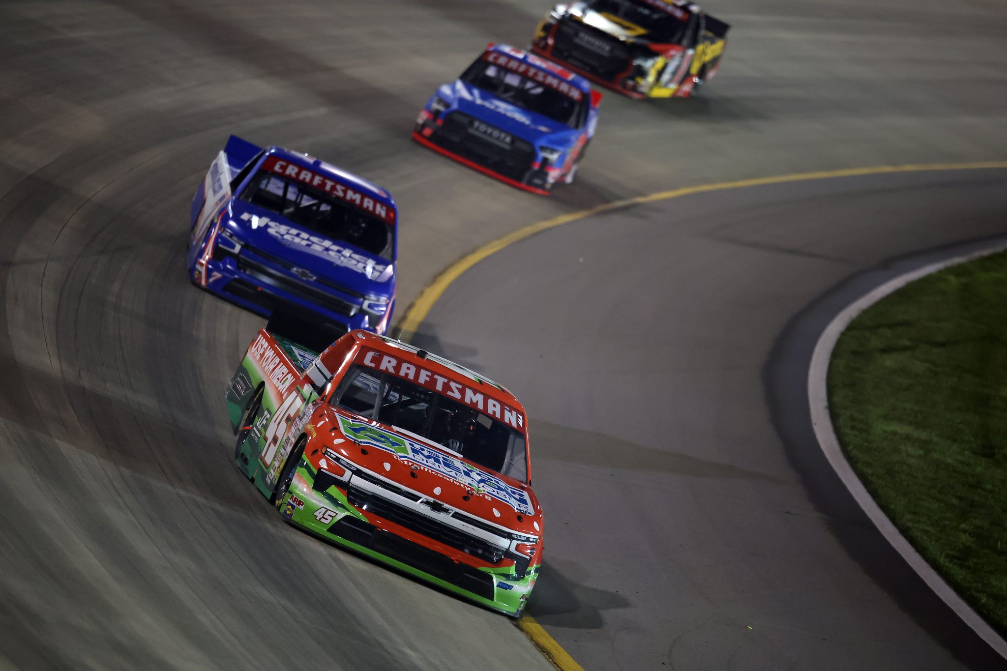 LEBANON, TENNESSEE - MAY 29: Ross Chastain, driver of the #45 Tennessee Highway Safety Office Chevrolet, and Rajah Caruth, driver of the #7 HendrickCars.com Chevrolet, race during the NASCAR Craftsman Truck Series Allegiance 200 at Nashville Superspeedway on May 29, 2026 in Lebanon, Tennessee. (Photo by Jonathan Bachman/Getty Images) | Getty Images
