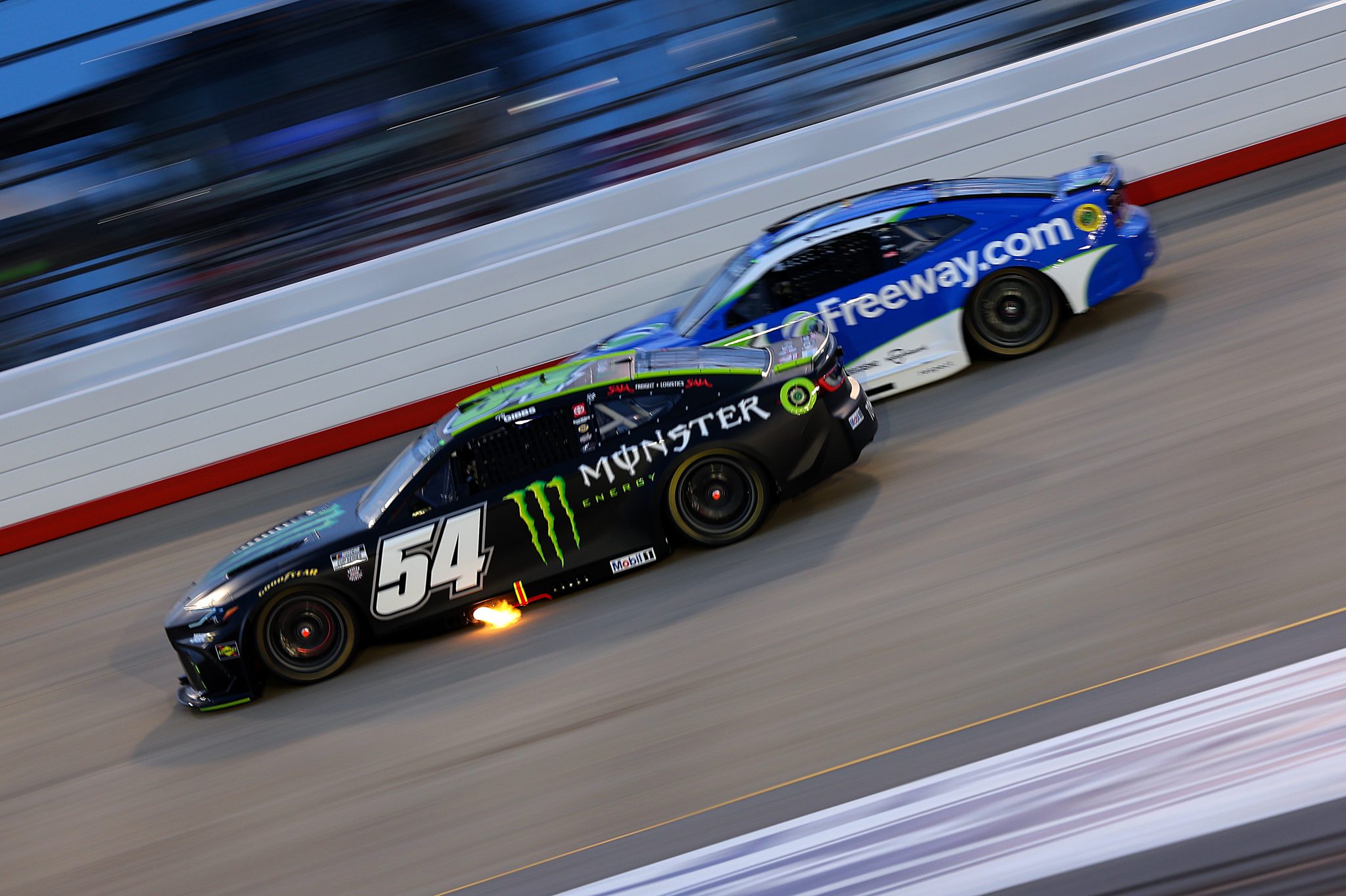 LEBANON, TENNESSEE - MAY 31: Ty Gibbs, driver of the #54 Monster Energy Toyota, and Daniel Suarez, driver of the #7 Freeway Insurance Chevrolet, race during the NASCAR Cup Series Cracker Barrel 400 at Nashville Superspeedway on May 31, 2026 in Lebanon, Tennessee. (Photo by Jonathan Bachman/Getty Images) | Getty Images
