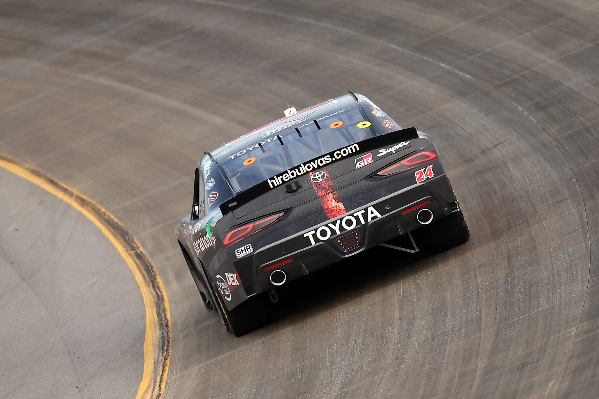 LEBANON, TENNESSEE - MAY 30: Harrison Burton, driver of the #24 Jesse Gerhard Memorial Fdn/Bulovas Toyota, drives during the NASCAR O'Reilly Auto Parts Series Sports Illustrated Resorts 250 at Nashville Superspeedway on May 30, 2026 in Lebanon, Tennessee. (Photo by Jonathan Bachman/Getty Images) | Getty Images