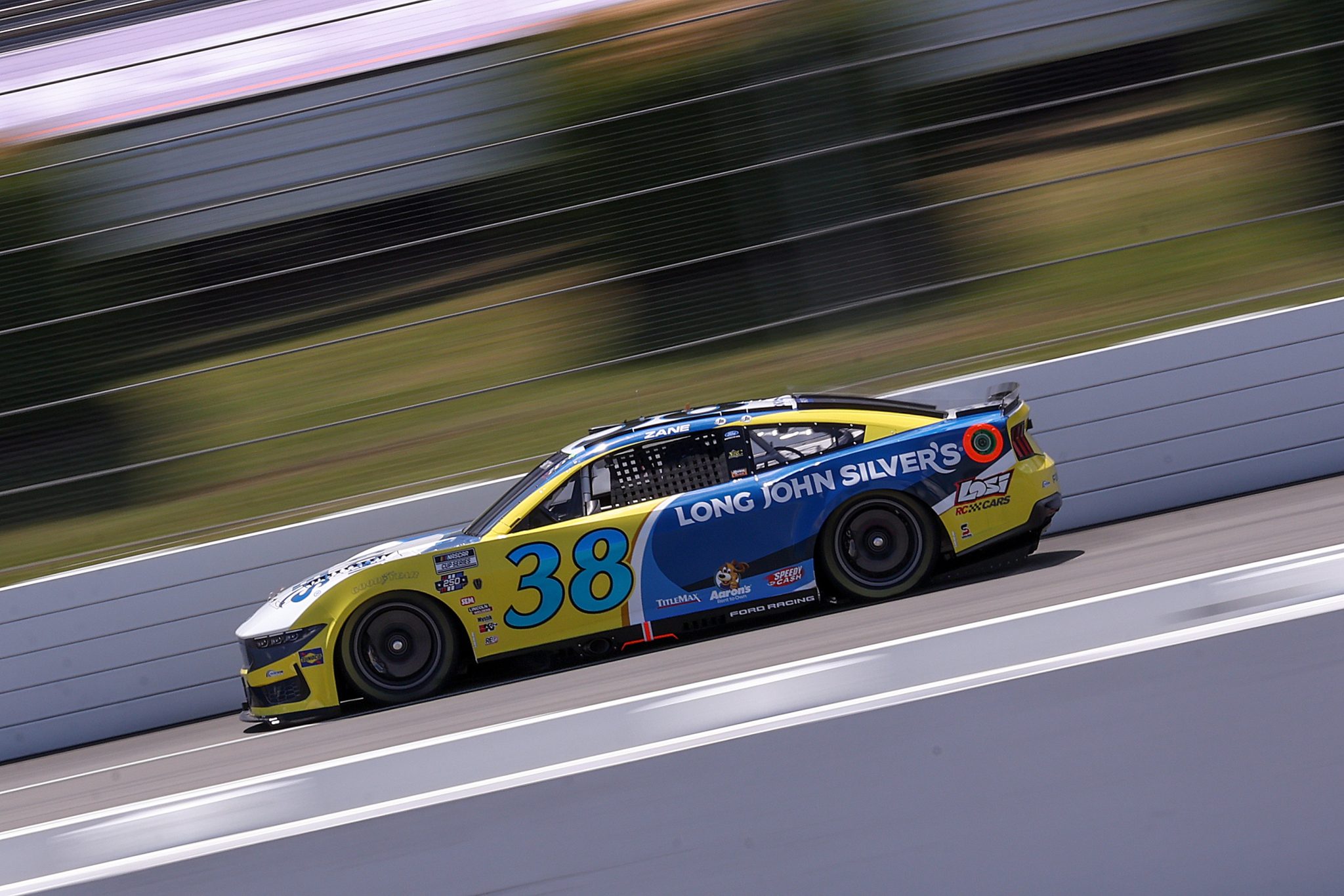 LONG POND, PENNSYLVANIA - JUNE 13: Zane Smith, driver of the #38 Long John Silver's Ford, drives during practice for the NASCAR Cup Series Great American Getaway 400 presented by VISITPA at Pocono Raceway on June 13, 2026 in Long Pond, Pennsylvania. (Photo by David Jensen/Getty Images) | Getty Images