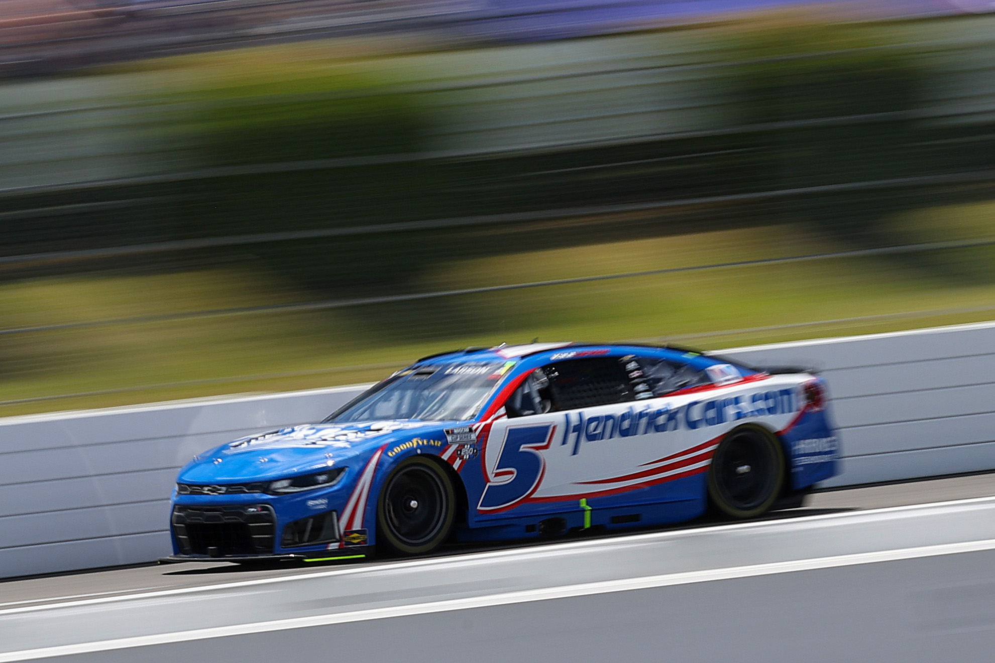 LONG POND, PENNSYLVANIA - JUNE 13: Kyle Larson, driver of the #5 HendrickCars.com Chevrolet, drives during practice for the NASCAR Cup Series Great American Getaway 400 presented by VISITPA at Pocono Raceway on June 13, 2026 in Long Pond, Pennsylvania. (Photo by James Gilbert/Getty Images) | Getty Images