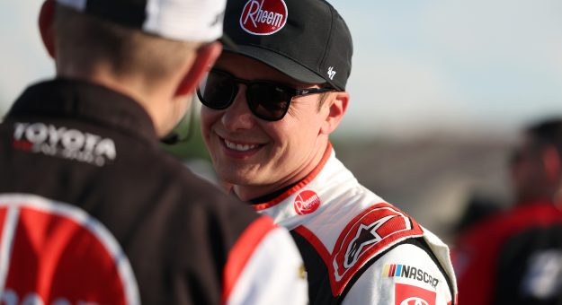 BROOKLYN, MICHIGAN - JUNE 06: Christopher Bell, driver of the #20 Rheem Toyota, speaks to a crew member during qualifying for the NASCAR Cup Series FireKeepers Casino 400 at Michigan International Speedway on June 06, 2026 in Brooklyn, Michigan. (Photo by Brett Farmer/Getty Images) | Getty Images