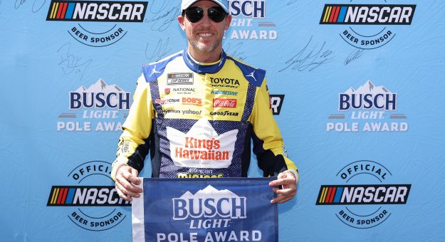 LONG POND, PENNSYLVANIA - JUNE 13: Denny Hamlin, driver of the #11 King's Hawaiian Shake 'Em Bites Toyota, poses for photos after winning the pole award during qualifying for the NASCAR Cup Series Great American Getaway 400 presented by VISITPA at Pocono Raceway on June 13, 2026 in Long Pond, Pennsylvania. (Photo by David Jensen/Getty Images) | Getty Images