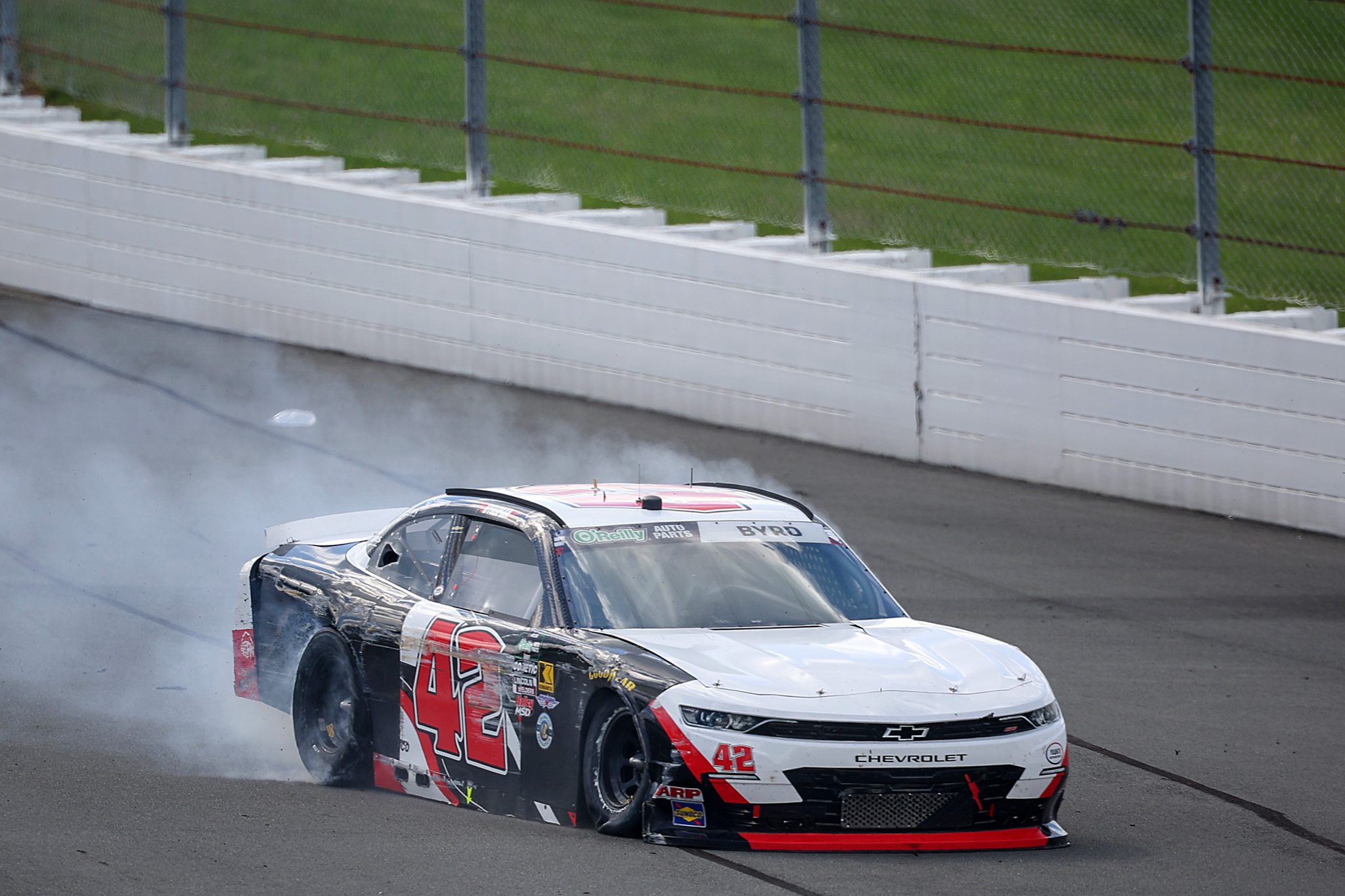 LONG POND, PENNSYLVANIA - JUNE 13: Nathan Byrd, driver of the #42 Chevrolet, drives after an on-track incident during the NASCAR O'Reilly Auto Parts Series MillerTech Battery 250 presented by KOA at Pocono Raceway on June 13, 2026 in Long Pond, Pennsylvania. (Photo by James Gilbert/Getty Images) | Getty Images