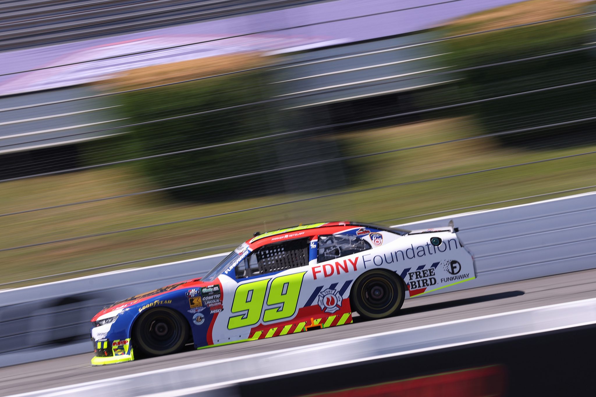 LONG POND, PENNSYLVANIA - JUNE 13: Parker Retzlaff, driver of the #99 FDNY Foundation Chevrolet, drives during practice for the NASCAR O'Reilly Auto Parts Series MillerTech Battery 250 presented by KOA at Pocono Raceway on June 13, 2026 in Long Pond, Pennsylvania. (Photo by David Jensen/Getty Images) | Getty Images