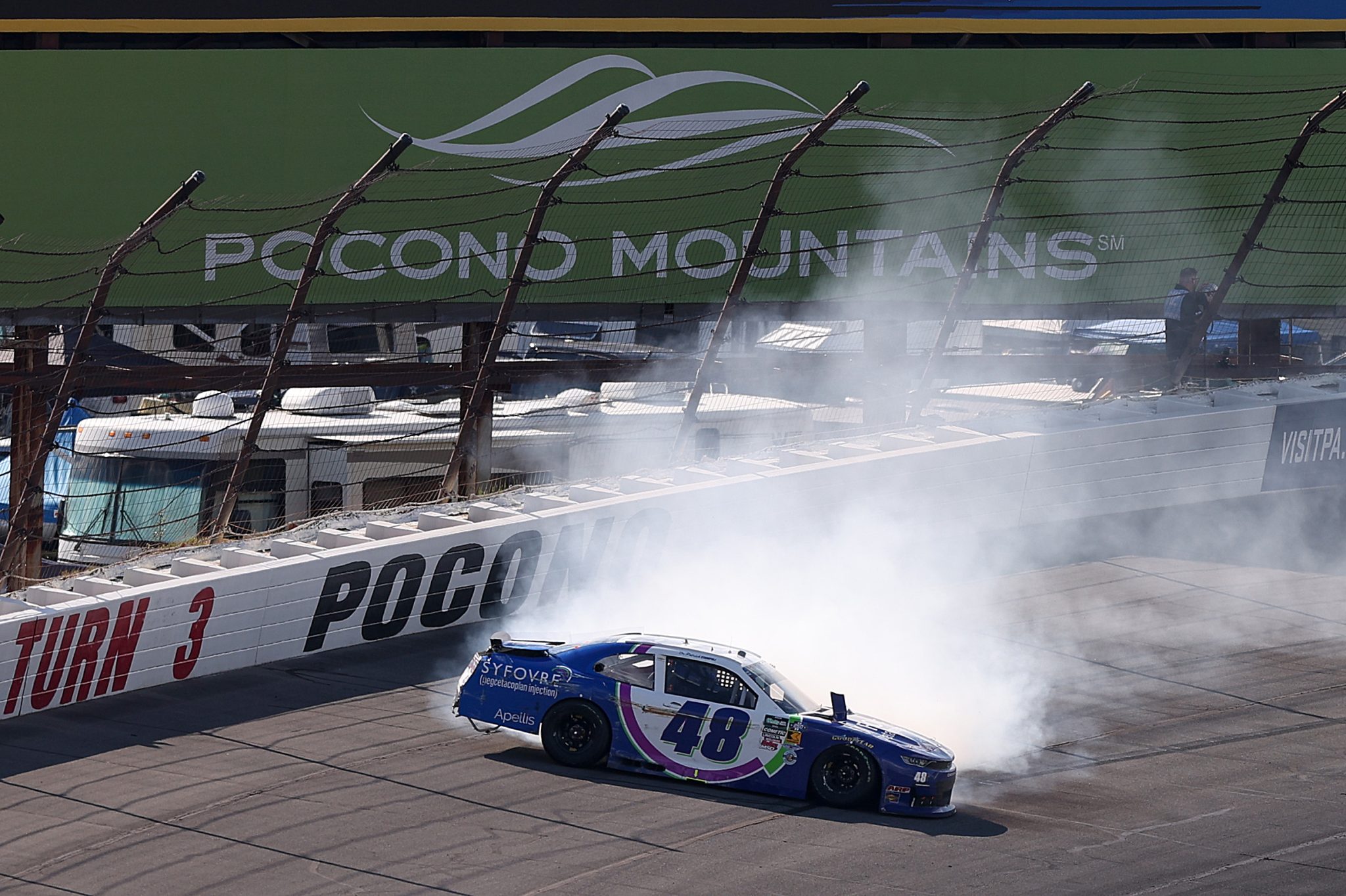 LONG POND, PENNSYLVANIA - JUNE 13: Leland Honeyman Jr., driver of the #92 VOLTZ by Raptor Power Chevrolet, spins after an on-track incident during the NASCAR O'Reilly Auto Parts Series MillerTech Battery 250 presented by KOA at Pocono Raceway on June 13, 2026 in Long Pond, Pennsylvania. (Photo by David Jensen/Getty Images) | Getty Images