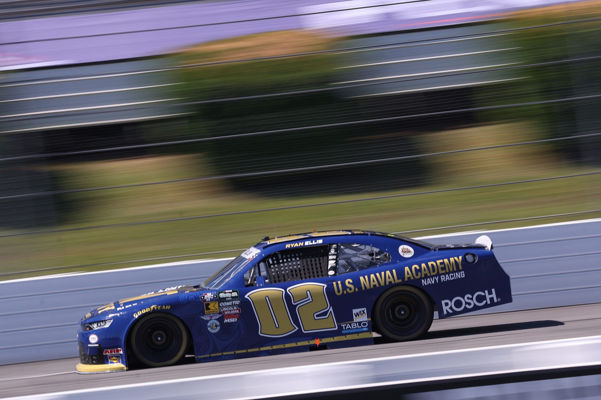 LONG POND, PENNSYLVANIA - JUNE 13: Ryan Ellis, driver of the #02 U.S. Naval Acadamy Chevrolet, drives during practice for the NASCAR O'Reilly Auto Parts Series MillerTech Battery 250 presented by KOA at Pocono Raceway on June 13, 2026 in Long Pond, Pennsylvania. (Photo by David Jensen/Getty Images) | Getty Images