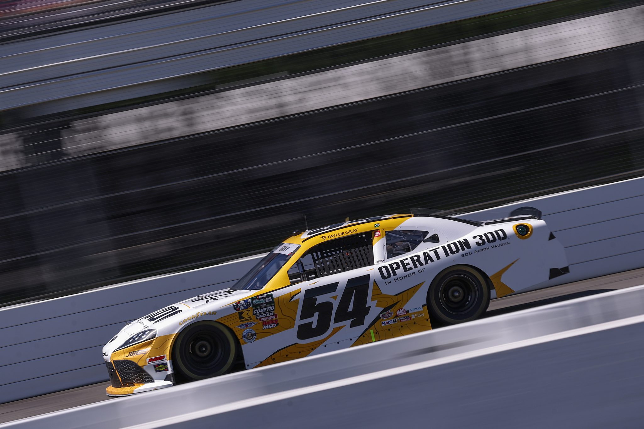 LONG POND, PENNSYLVANIA - JUNE 13: Taylor Gray, driver of the #54 Operation 300 Toyota, drives during practice for the NASCAR O'Reilly Auto Parts Series MillerTech Battery 250 presented by KOA at Pocono Raceway on June 13, 2026 in Long Pond, Pennsylvania. (Photo by David Jensen/Getty Images) | Getty Images