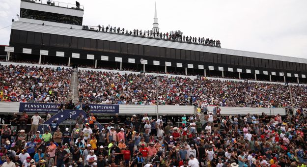LONG POND, PENNSYLVANIA - JUNE 14: A general view of the grandstands during the NASCAR Cup Series Great American Getaway 400 presented by VISITPA at Pocono Raceway on June 14, 2026 in Long Pond, Pennsylvania. (Photo by James Gilbert/Getty Images) | Getty Images