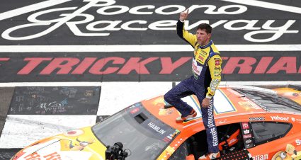 LONG POND, PENNSYLVANIA - JUNE 14: Denny Hamlin, driver of the #11 King's Hawaiian Shake 'Em Bites Toyota, celebrates after winning the NASCAR Cup Series Great American Getaway 400 presented by VISITPA at Pocono Raceway on June 14, 2026 in Long Pond, Pennsylvania. (Photo by James Gilbert/Getty Images) | Getty Images
