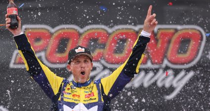 LONG POND, PENNSYLVANIA - JUNE 14: Denny Hamlin, driver of the #11 King's Hawaiian Shake 'Em Bites Toyota, celebrates in victory lane after winning the NASCAR Cup Series Great American Getaway 400 presented by VISITPA at Pocono Raceway on June 14, 2026 in Long Pond, Pennsylvania. (Photo by David Jensen/Getty Images) | Getty Images