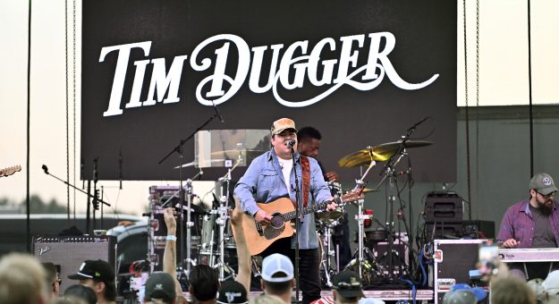 BROOKLYN, MICHIGAN - AUGUST 17: Tim Dugger performs during a concert after the NASCAR Xfinity Series Cabo Wabo 250 at Michigan International Speedway on August 17, 2024 in Brooklyn, Michigan. (Photo by Logan Riely/Getty Images) | Getty Images