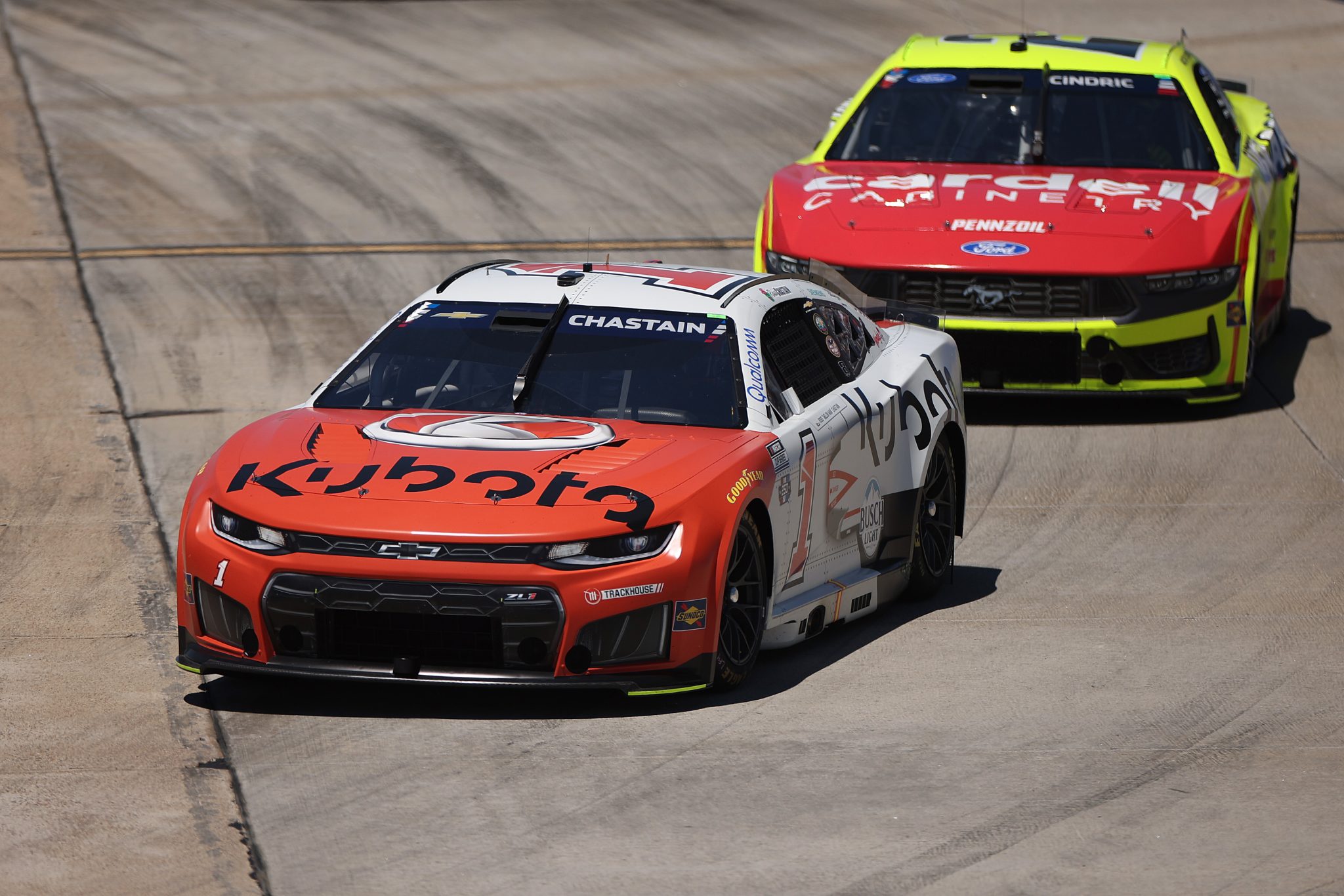 SAN DIEGO, CALIFORNIA - JUNE 21: Ross Chastain, driver of the #1 Kubota Veterans Honor Chevrolet, and Austin Cindric, driver of the #2 Menards/Cardell Cabinetry Ford, race during the NASCAR Cup Series Anduril 250 at Naval Base Coronado on June 21, 2026 in San Diego, California. (Photo by James Gilbert/Getty Images) | Getty Images