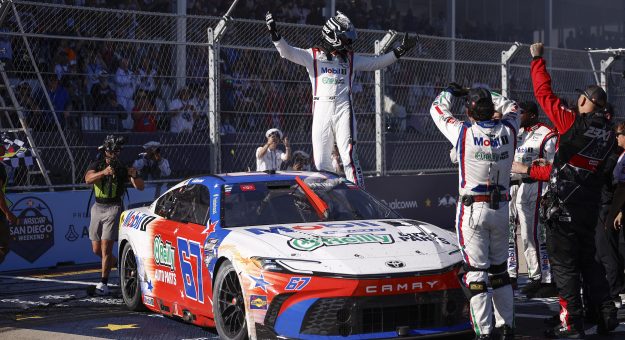 SAN DIEGO, CALIFORNIA - JUNE 21: Corey Heim, driver of the #67 Mobil 1/O'Reilly Auto Parts Toyota, and crew celebrate after winning the NASCAR Cup Series Anduril 250 at Naval Base Coronado on June 21, 2026 in San Diego, California. (Photo by Sean Gardner/Getty Images) | Getty Images