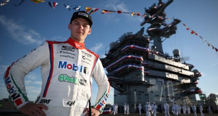 SAN DIEGO, CALIFORNIA - JUNE 21: Corey Heim, driver of the #67 Mobil 1/O'Reilly Auto Parts Toyota, poses for a photo on the deck of the The USS Carl Vinson (CVN-70) after winning the NASCAR Cup Series Anduril 250 at Naval Base Coronado on June 21, 2026 in San Diego, California. (Photo by Chris Graythen/Getty Images) | Getty Images