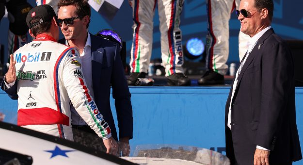 SAN DIEGO, CALIFORNIA - JUNE 21: Ben Kennedy, NASCAR Chief Operating Officer (L) and NASCAR Chief Executive Officer Steve O’Donnell congratulate Corey Heim, driver of the #67 Mobil 1/O'Reilly Auto Parts Toyota, in victory lane after winning the NASCAR Cup Series Anduril 250 at Naval Base Coronado on June 21, 2026 in San Diego, California. (Photo by David Jensen/Getty Images) | Getty Images