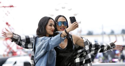 SONOMA, CALIFORNIA - JUNE 12: WWE wrestlers Brie Bella and Nikki Bella pose for photos on the midway prior to the NASCAR Cup Series Toyota/Save Mart 350 at Sonoma Raceway on June 12, 2022 in Sonoma, California. (Photo by Sean Gardner/Getty Images) | Getty Images